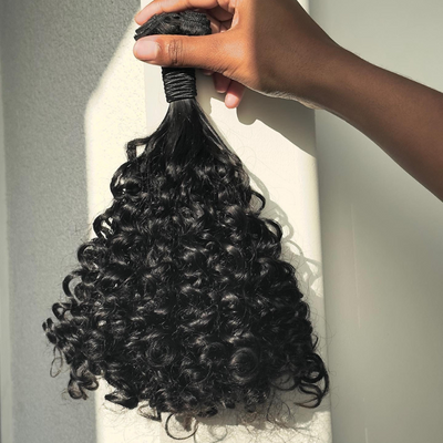 Natural curls, curly weave. This is our Caribbean curls. Type 3 curls. Loose curls