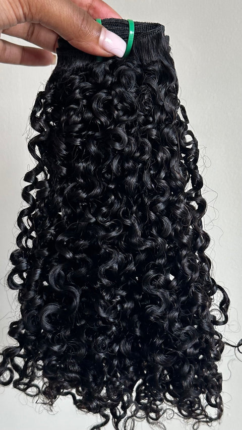 Natural curls, curly weave. This is our passion curls. Type 3/4 curls. Tight curls, but not as tight as kinky curls