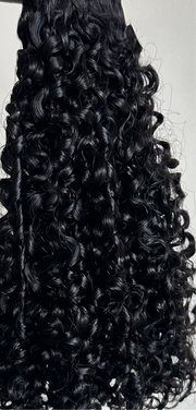 Natural curls, curly weave. This is our passion curls. Type 3/4 curls. Tight curls, but not as tight as kinky curls