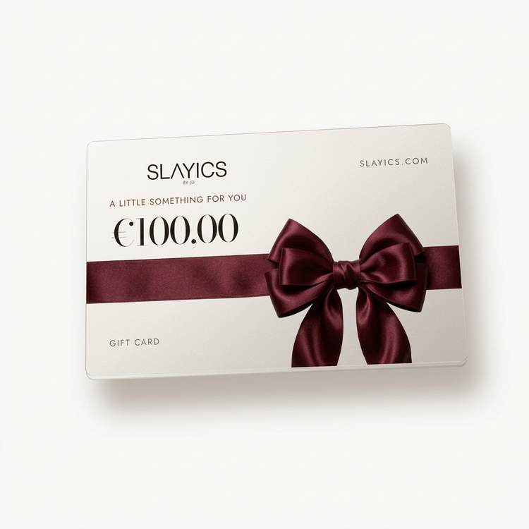 SLAYICS gift card with a burgundy satin ribbon and bow